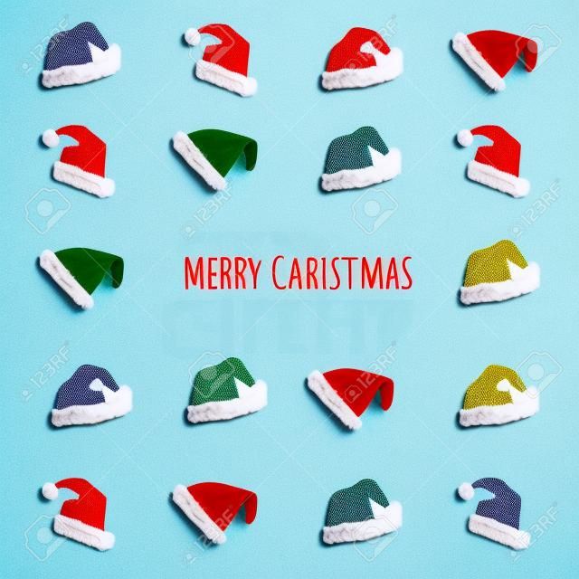 Creative Santa Claus hat pattern with bright background. Minimal winter flat lay Christmas concept. Merry Christmas
