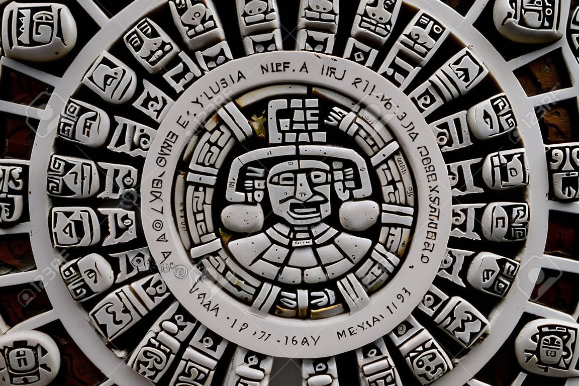 Maya aztec mexican calendar stone close up