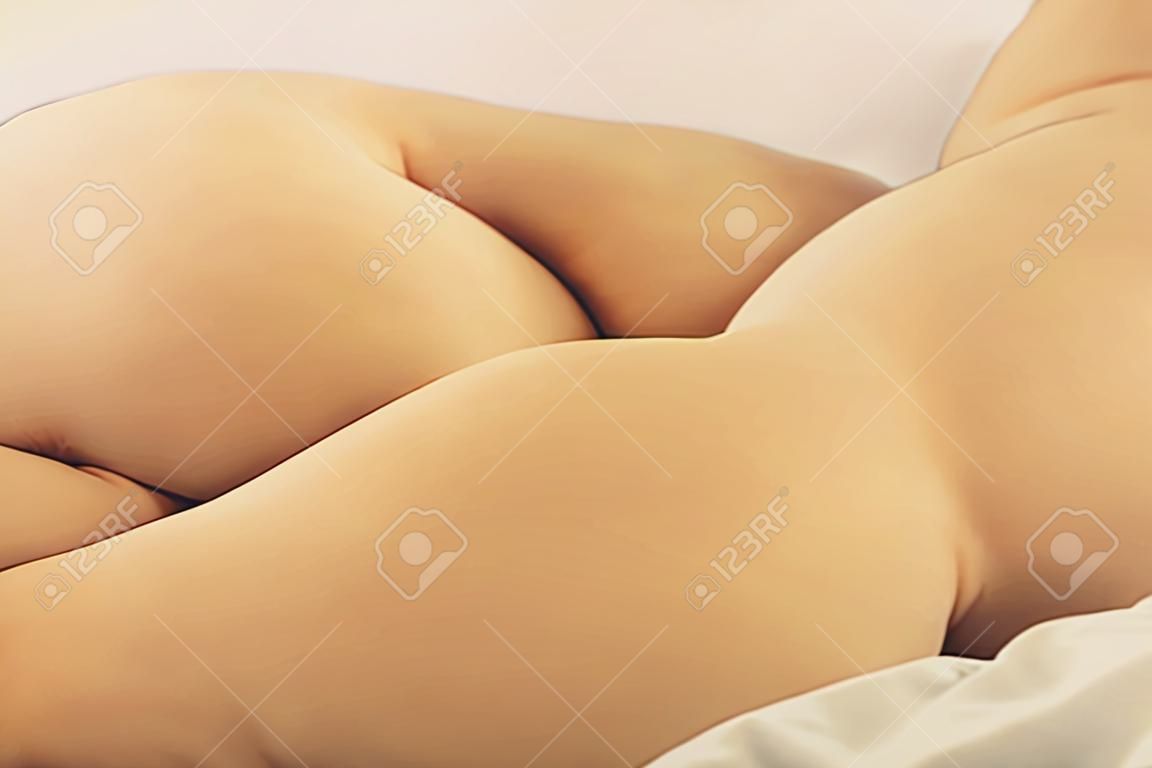 Smiling girl lying leisurely in bed in morning