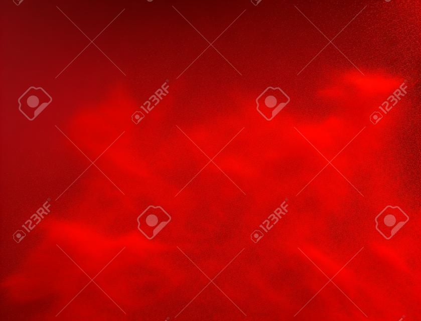 Explosion of red powder, isolated on white background