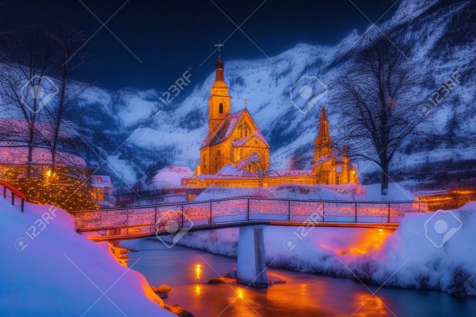 Beautiful twilight view of Sankt Sebastian pilgrimage church with decorated Christmas tree illuminated