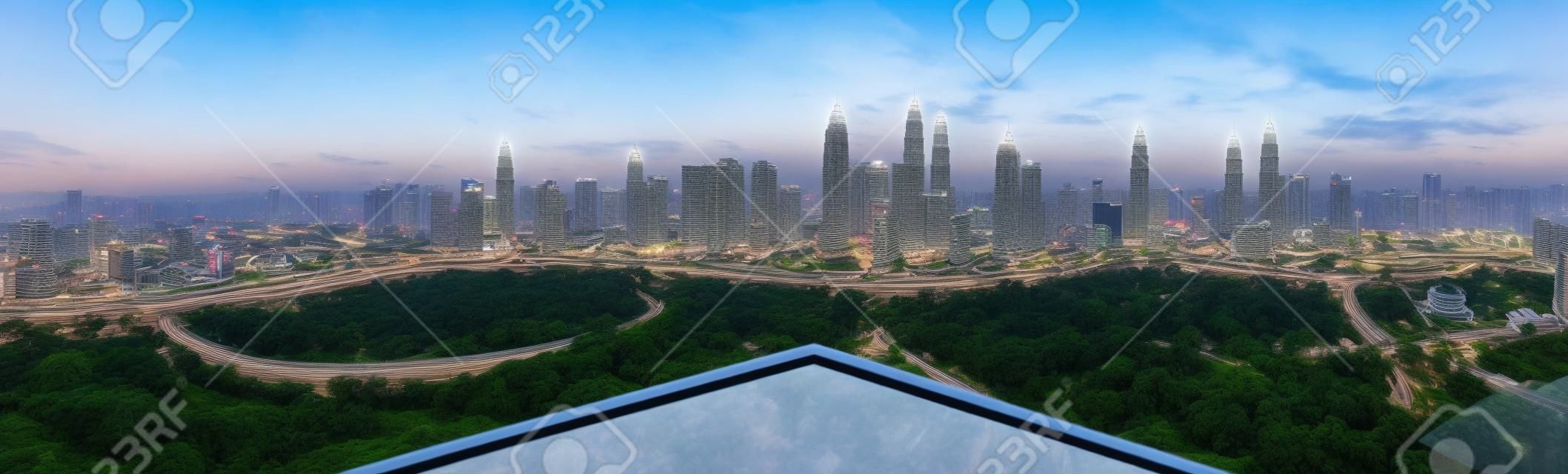Open space balcony with Kuala Lumpur cityscape skyline view  .