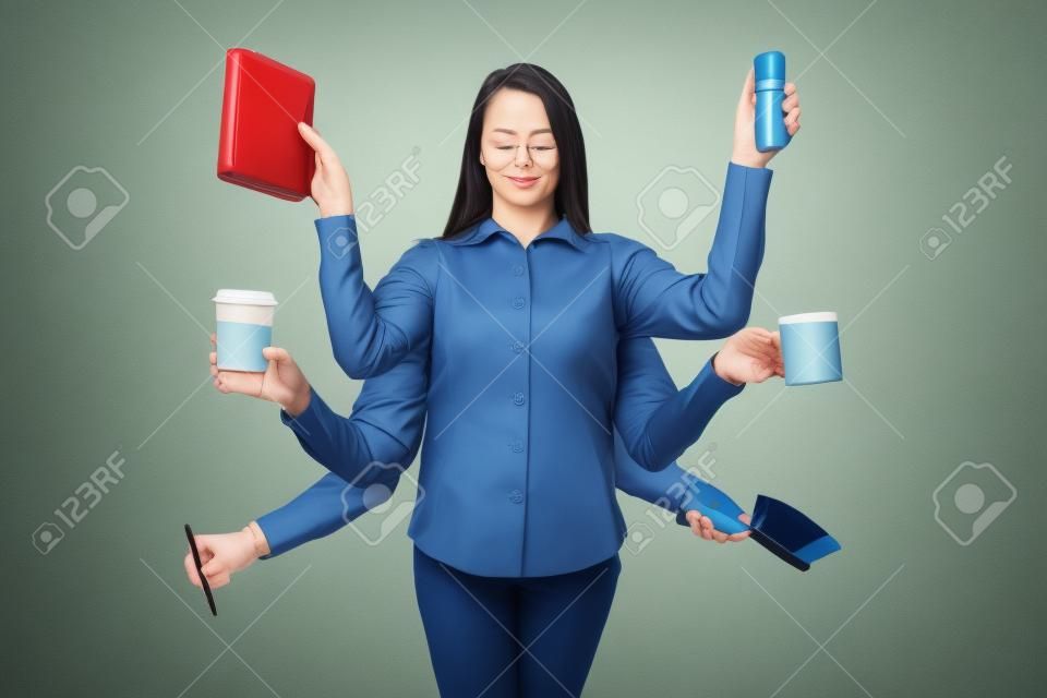 busy woman with many arms multitasking concept