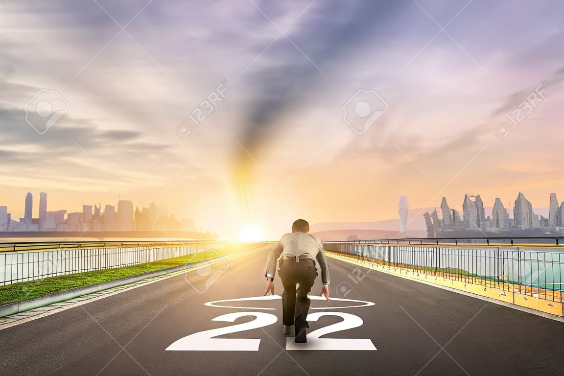 businessman person ready to run 2023 toward the city. Business start-up concept.