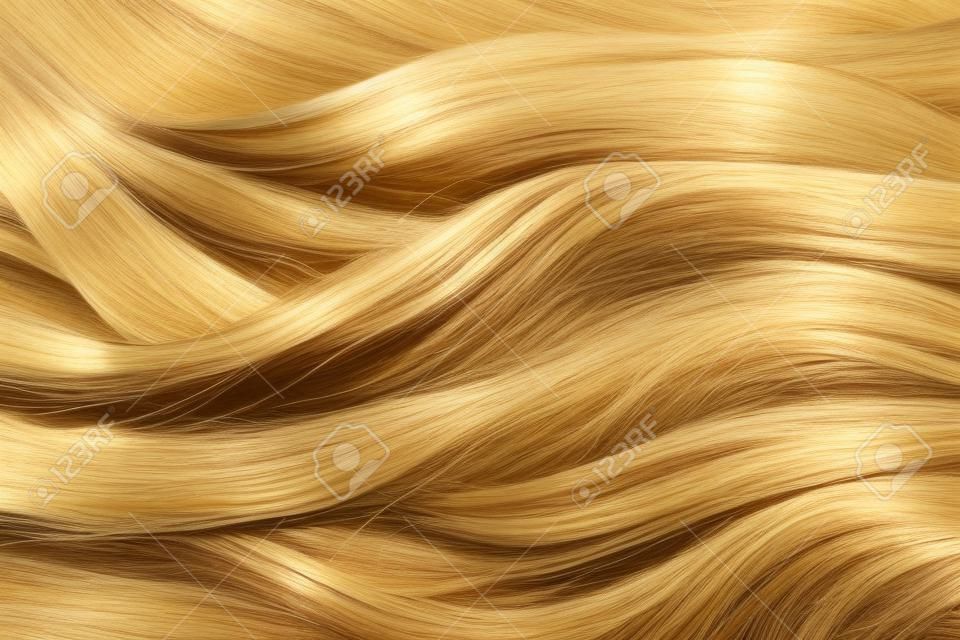 美麗健康光澤的頭髮的質地突出金色的條紋