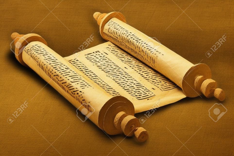 Ancient scrolls of papyrus paper with Hebrew text