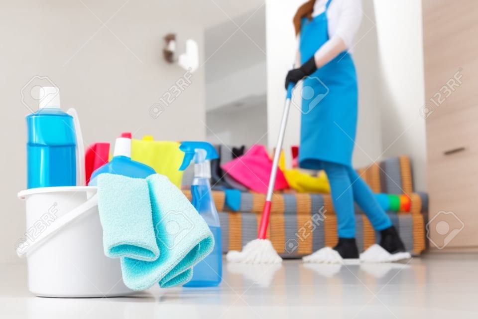 Clean the house concept. A beautiful woman who is cleaning her house by mopping the floor, Cleanliness is important. The front is a cleaning device.
