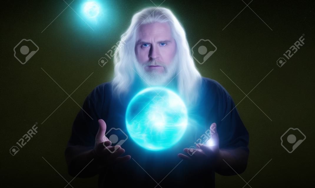 Long haired white male with a mystical glowing orb to signify power, magic, spirituality and so forth