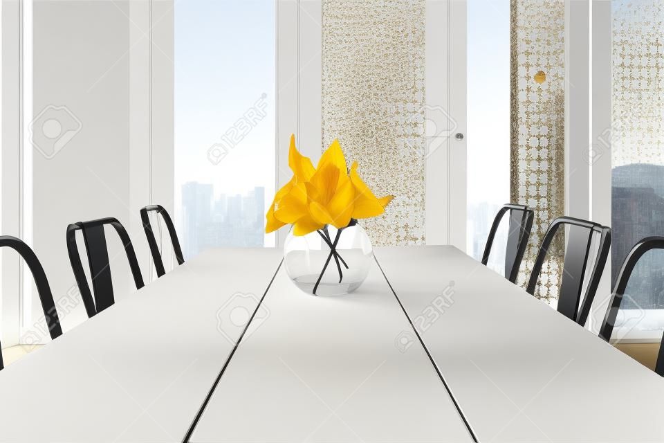Uncluttered light bright contemporary dining room table with glass doors background