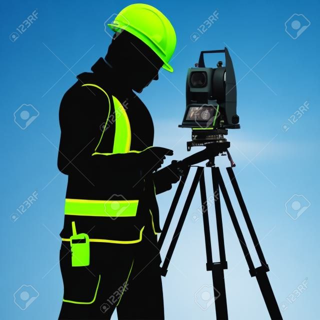 Uniformed surveyor and total station silhouette for geoedesy