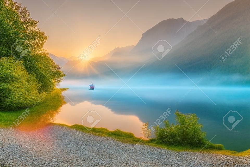 Colorful morning scene on Grundlsee lake with yacht. Beautiful summer sunrise in Gessl village, Liezen District of Styria, Austria, Alps. Europe. Artistic style post processed photo.