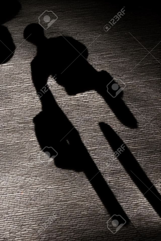 it is human shadow on floor.