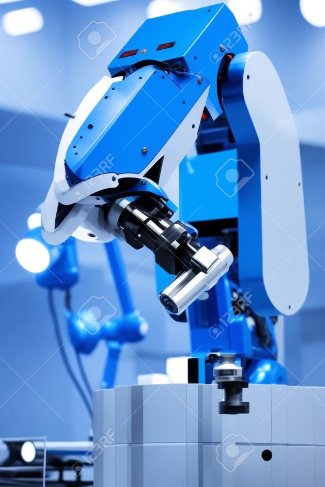 Robotics. Mechanical precision arm of robot manipulator with detail during positioning at facory