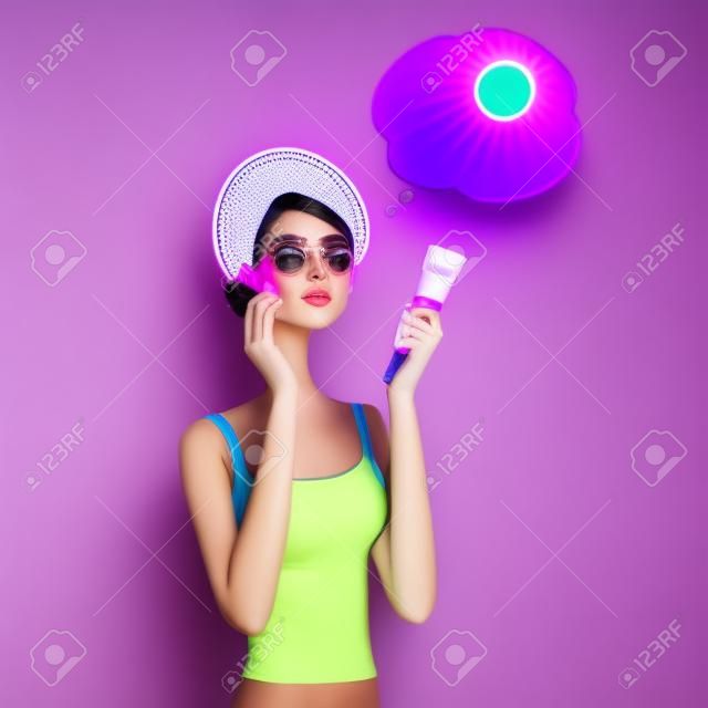 Mujeres que aplican cuidado UV