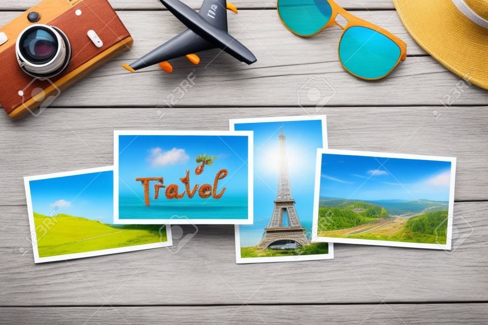 Travel concept with vacation photos, airplane toy, camera and sunglasses on wooden table. Top view flat lay with copy space