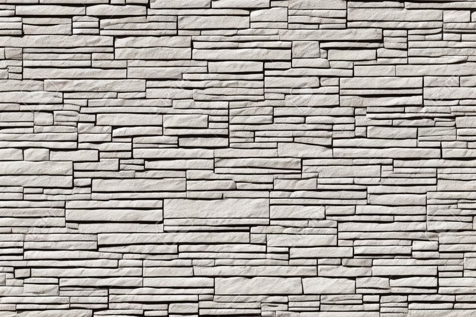 Textura superficial de la pared de ladrillo de piedra moderna blanca para el fondo