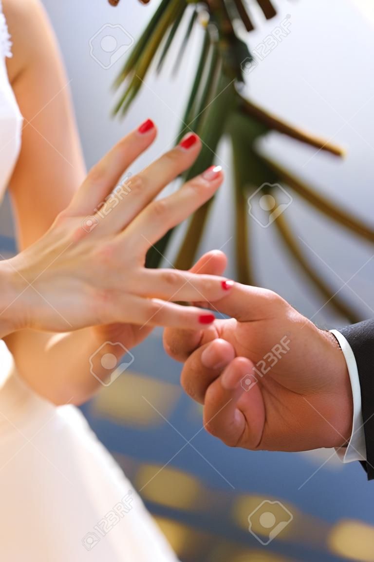 Close up view of hand during a marriage proposal