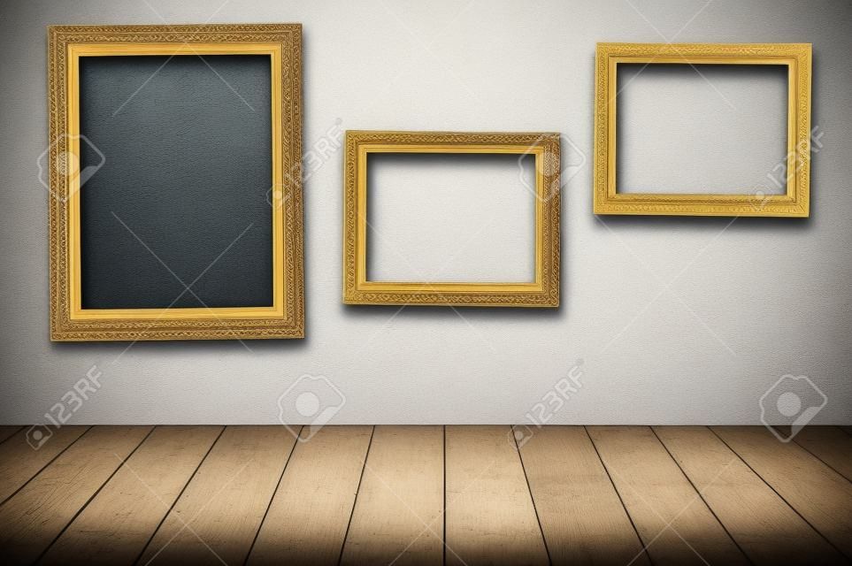 Three vintage frames on the wall 
