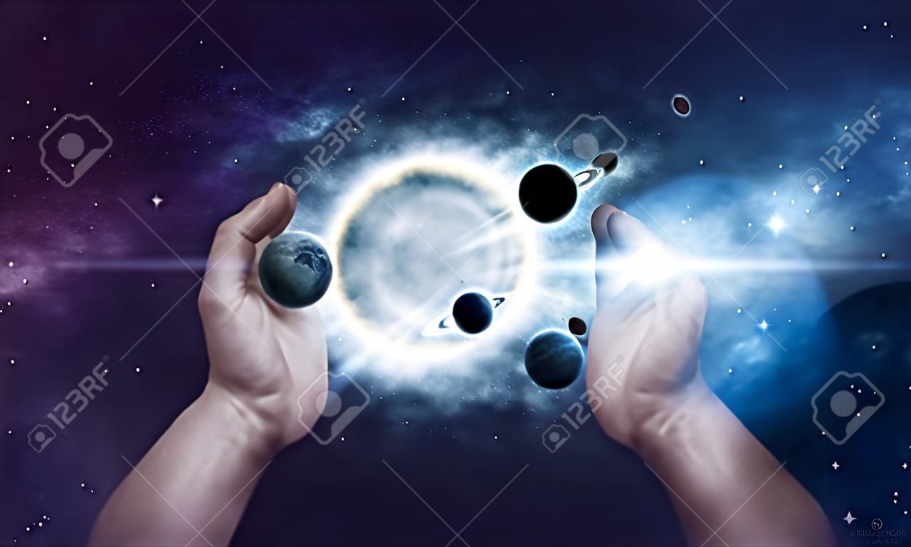 Two hands holding the sun and planets in the universe