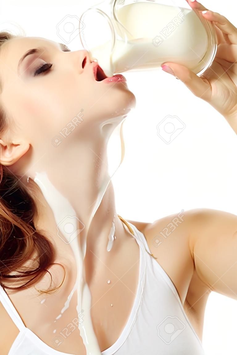 teenager girl drinking milk isolated on white background