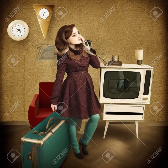 art portrait of young woman standing in room calling phone with vintage wallpaper and interior with tv, clocks, chair and suitcase, retro stylization 60-70s, toned