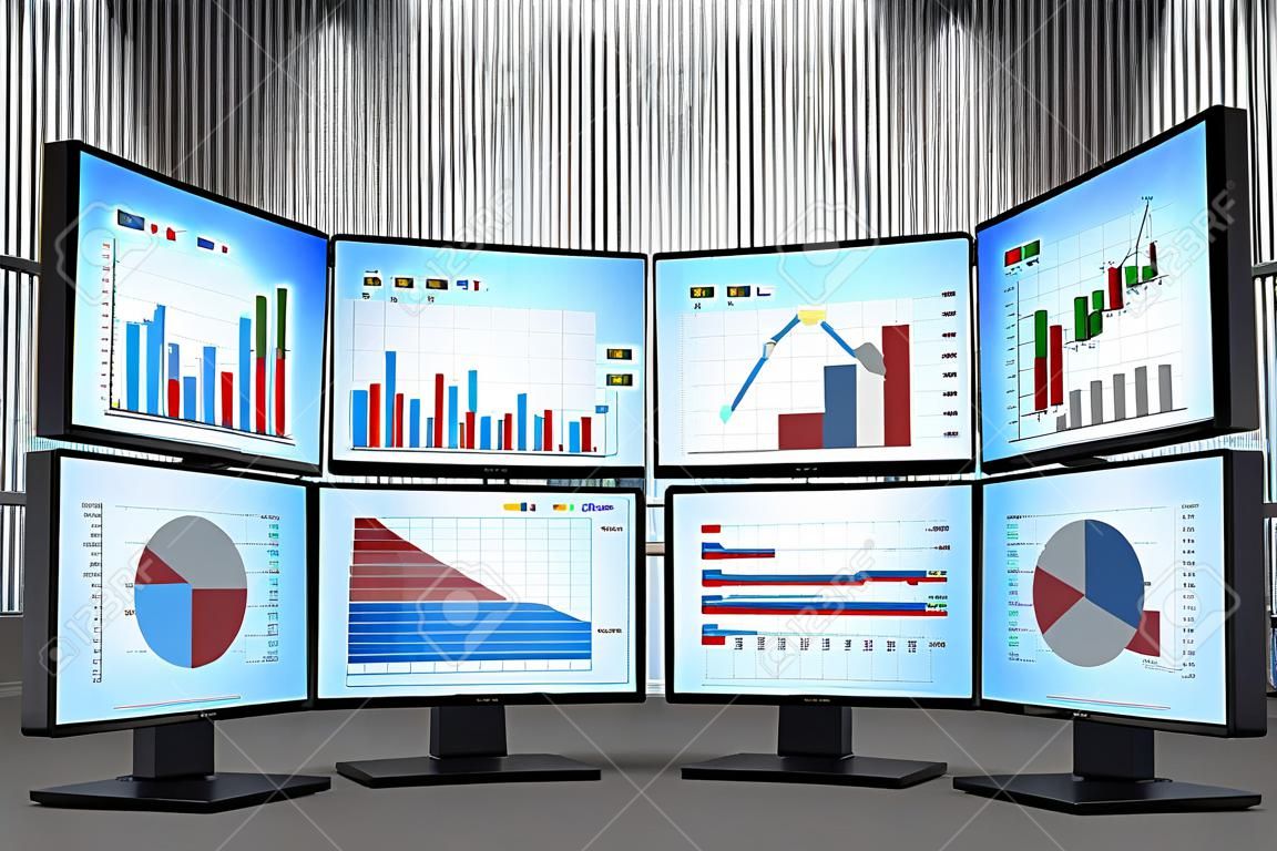 trading station which consists of four screens with financial data