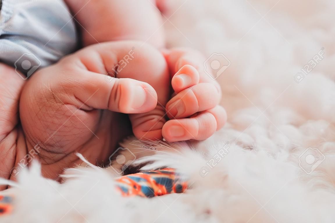 Little fingers newborn hold for dad's finger, very cute