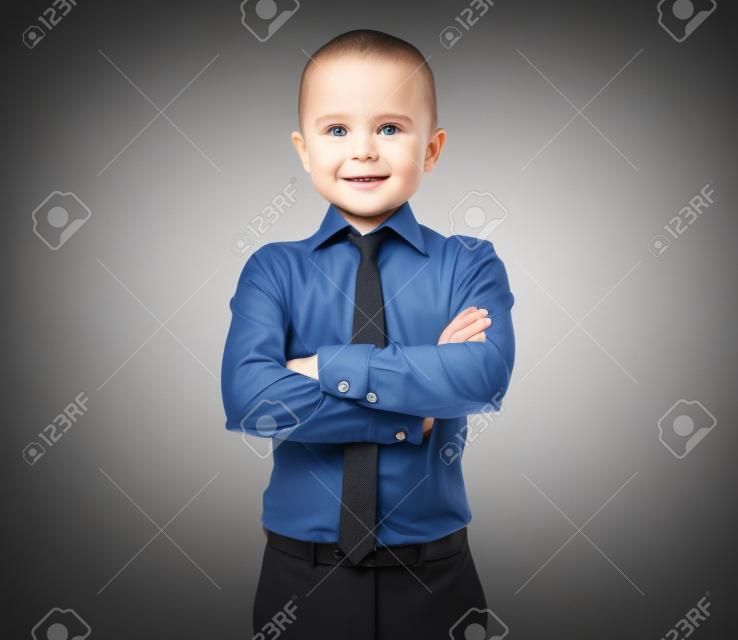 business man with baby face over grey background