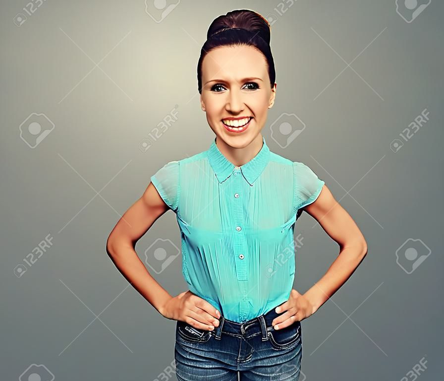 beautiful young woman with big head smiling and looking at camera