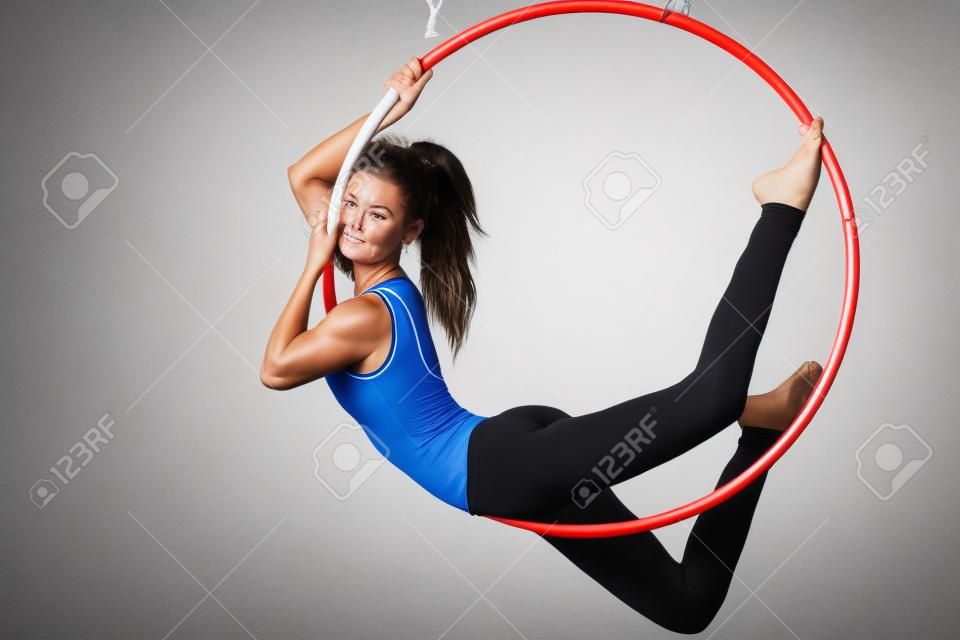 Portrait of an athlete in the air ring isolated on white background