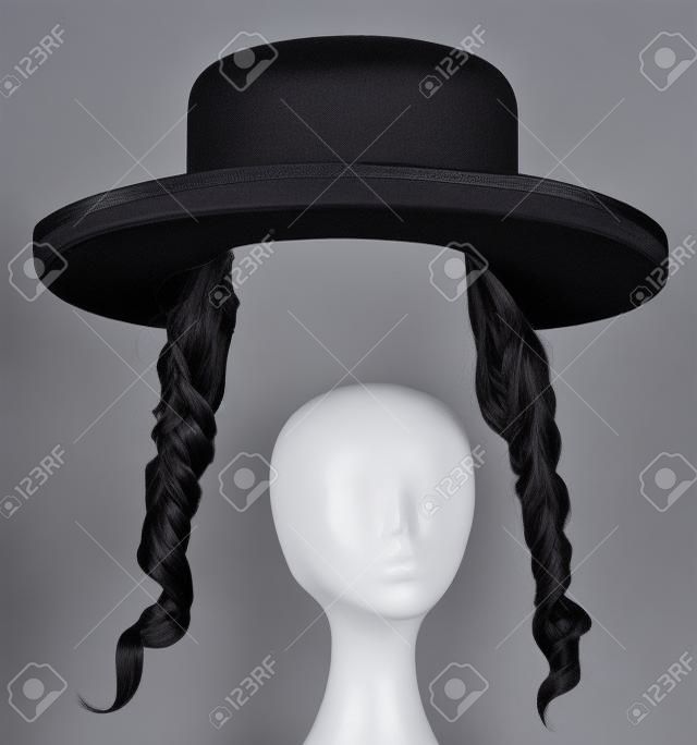 black hair sidelocks. mask wig jew hassid in hat.