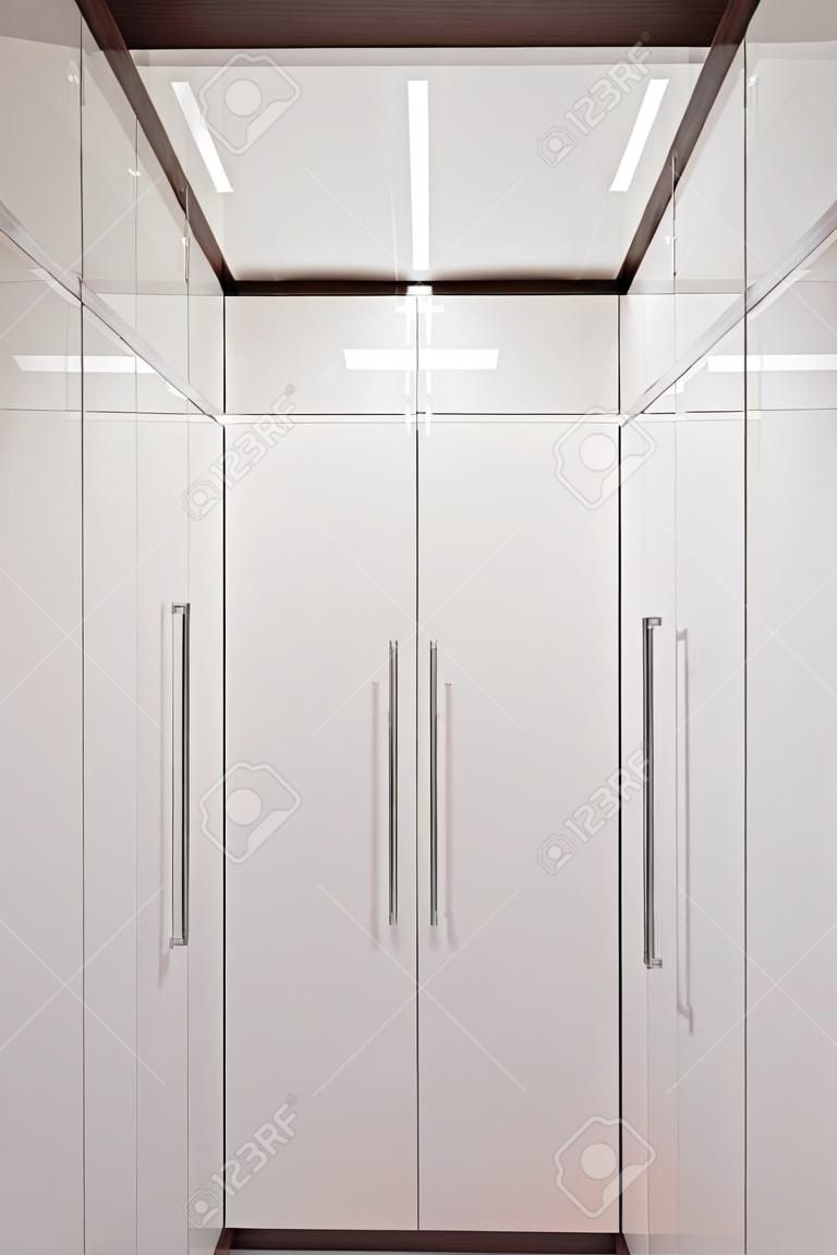 Interior of a simple and large wardrobe. 