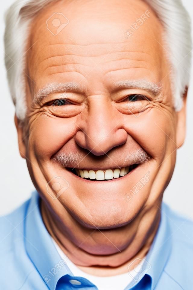 Smiling happy elderly man. Isolated over white background
