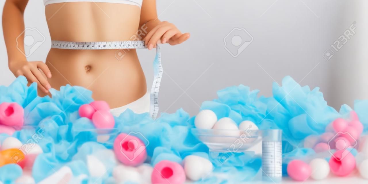 Mujer medir su cuerpo