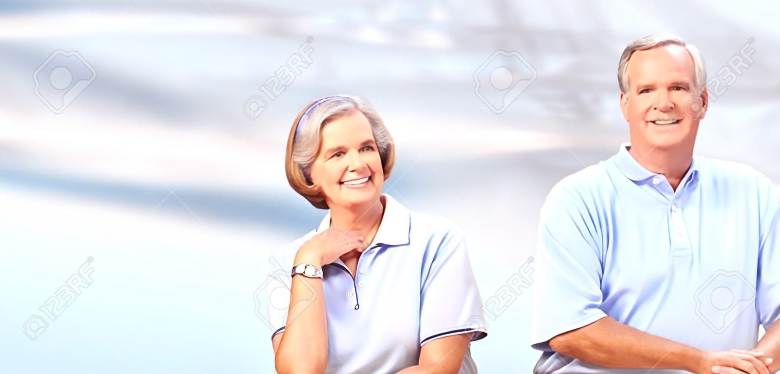 Senior couple smiling.