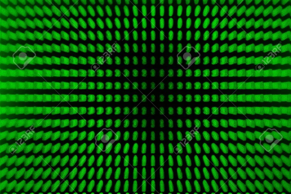 A set of random binaries captured from an LCD screen created with a spreadsheet program with glowing green letters on a black background with zoom burst technique applied