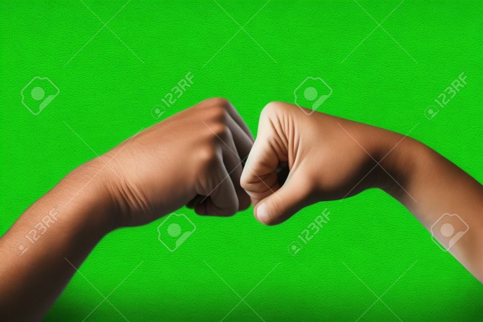man and woman hand fist on green leave background