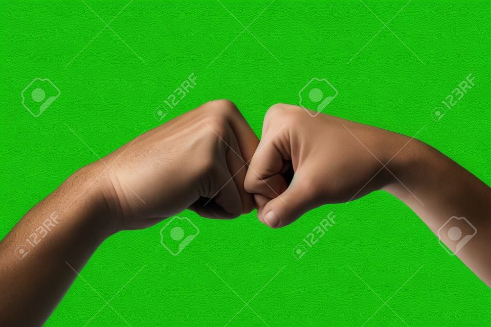 man and woman hand fist on green leave background