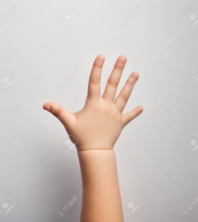 mão da criança em um fundo branco