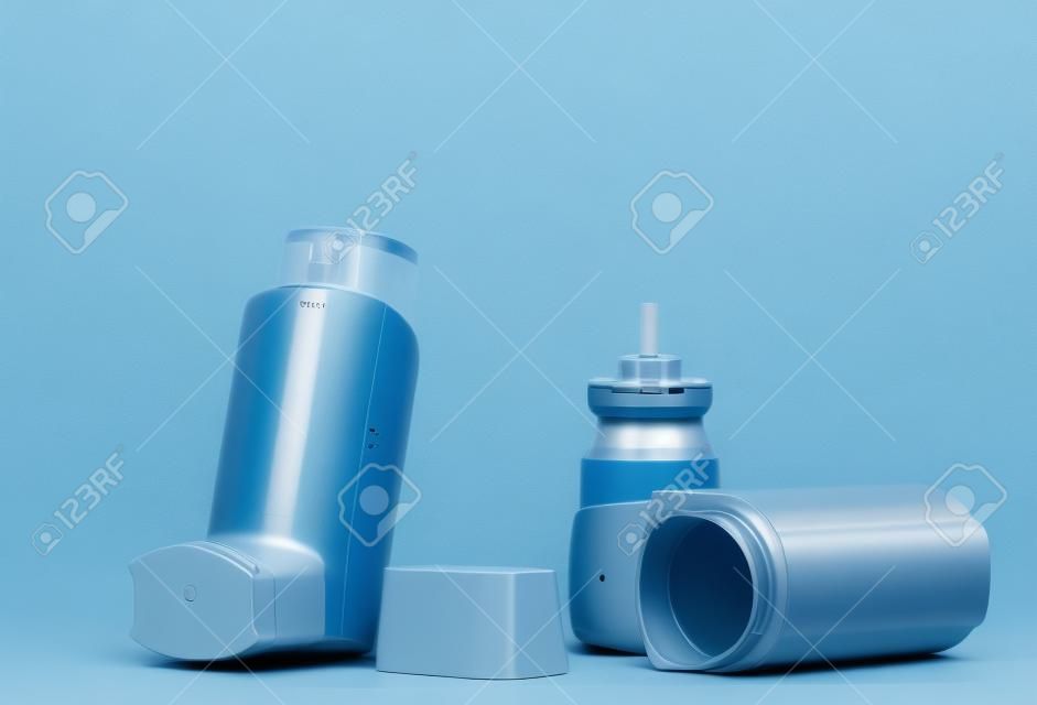 Device for inhalation with a dispenser on gray background