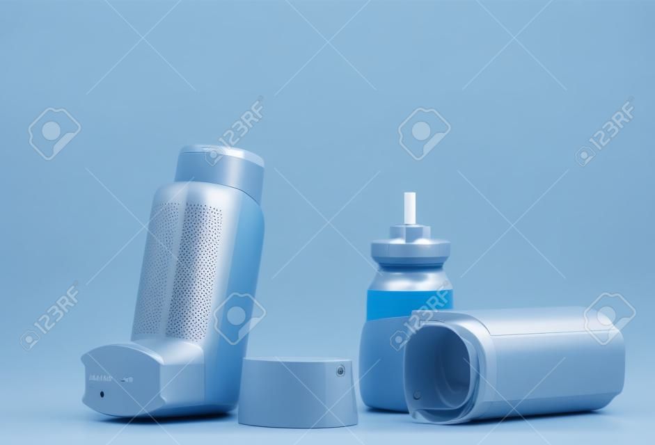 Device for inhalation with a dispenser on gray background