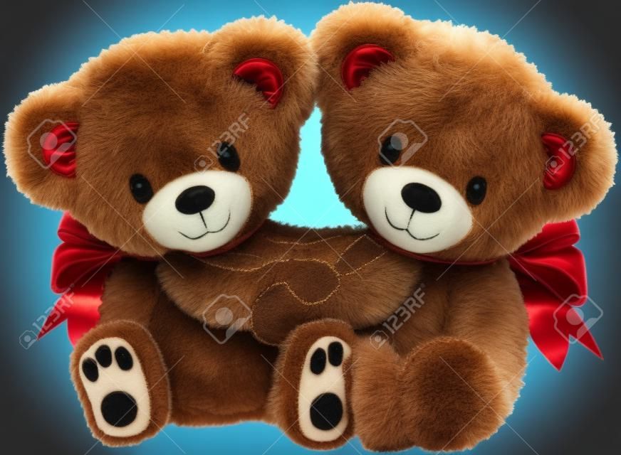 Two cute Teddy bears hugging