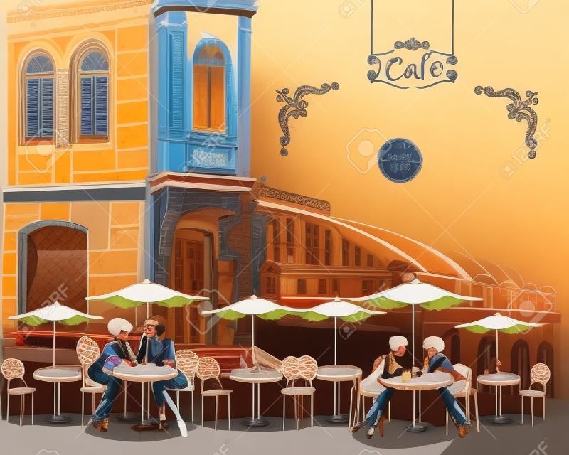 Series of street cafes with people drinking coffee in the old city
