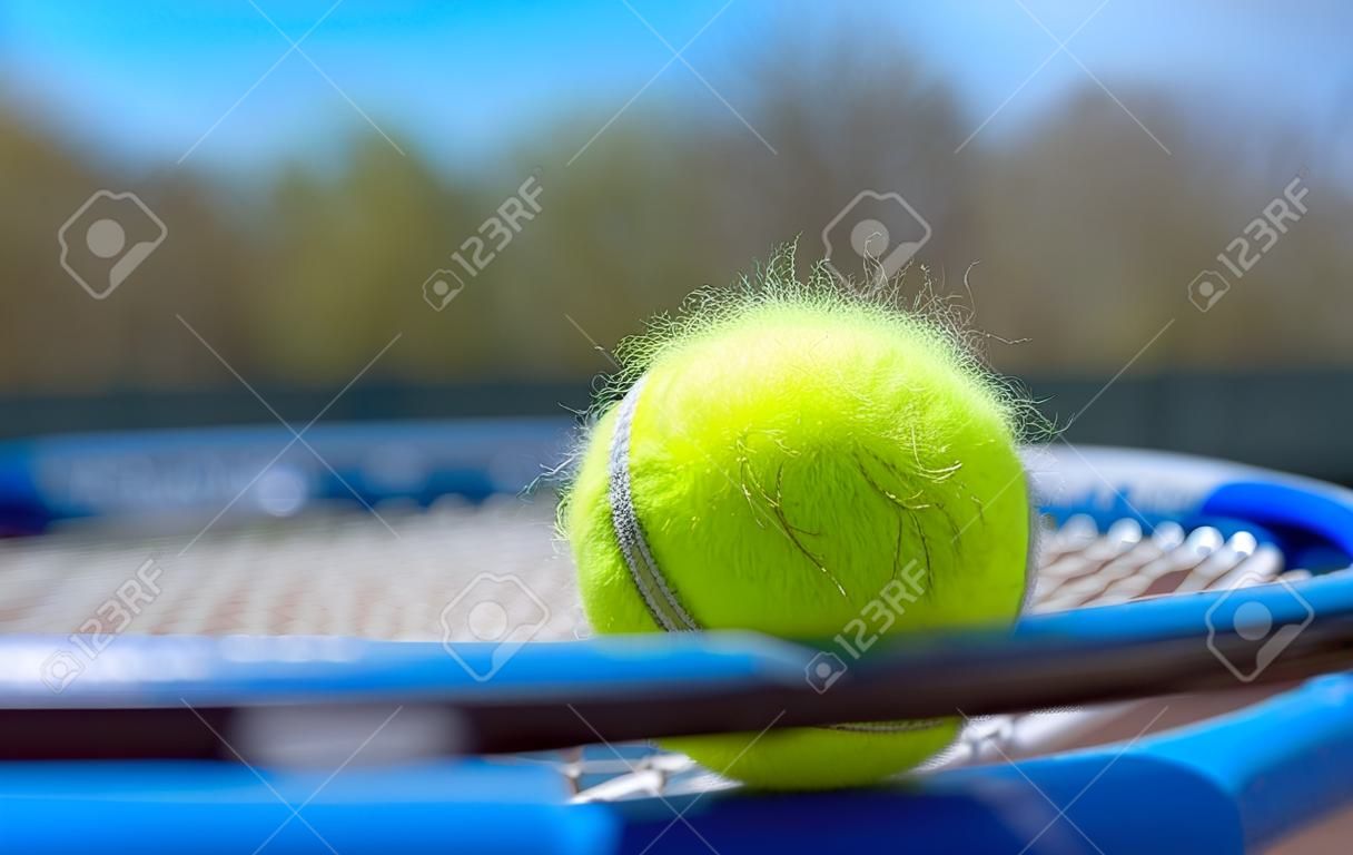 Haired tennis ball on a racquet