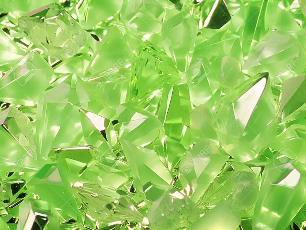 緑色の背景にある結晶のグループ