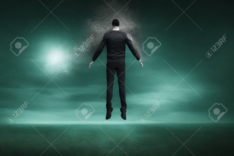 Floating man with disintegration effect