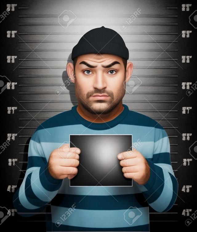 Criminal Foto Gefangen Verbrecher steht neben Wand mit der Nummer in der Hand