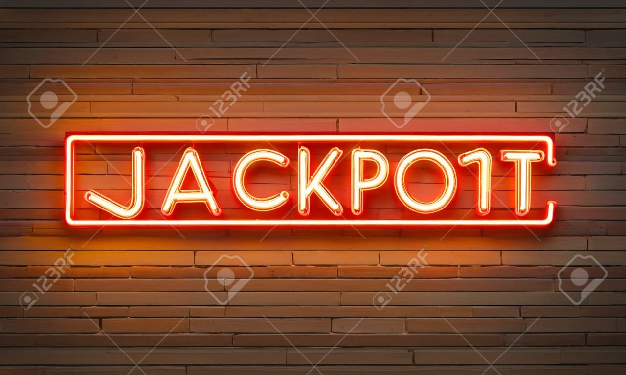 Jackpot neon sign on brick wall background