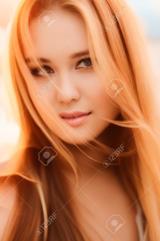 Beautiful Young Woman looking at camera