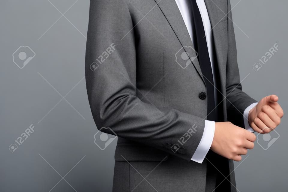 man in suit on a grey background